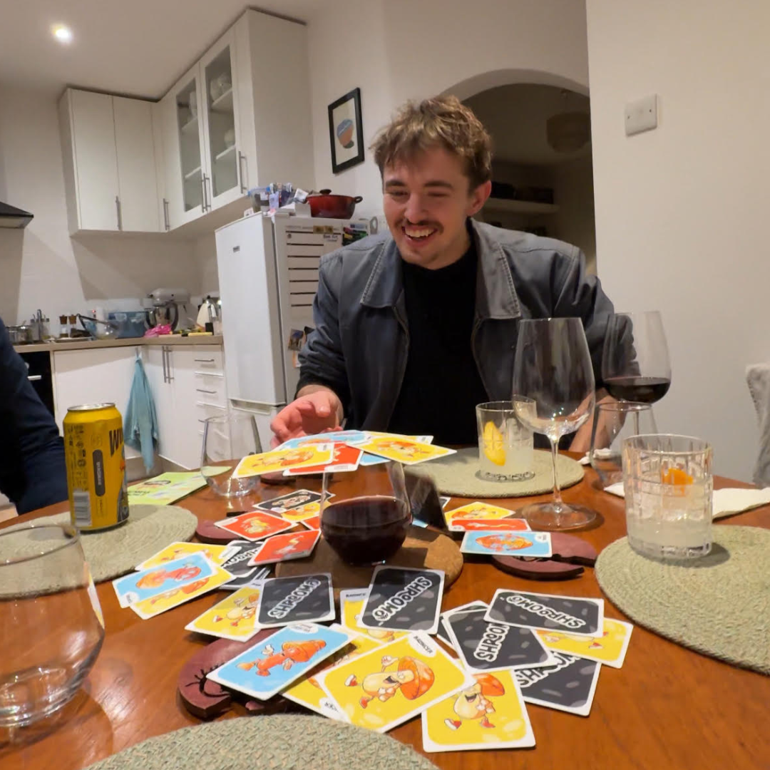 Shroomo speciality cards including Myco Master, Balancer and Fungal Flip spread out on a table
